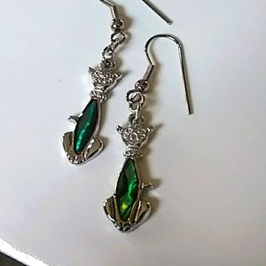 Green silver tone cat earrings